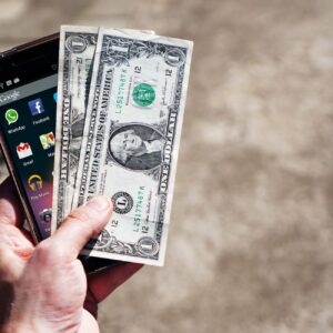 mobile-phone-money-banknotes-us-dollars-163069.jpeg